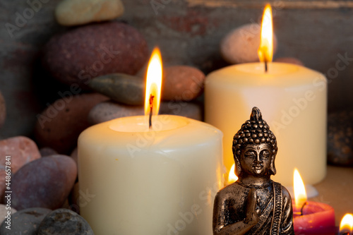buddha statue with candles for meditation