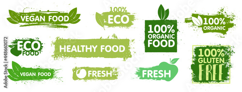 Natural organic food stickers. Vegan food logo. Organic, eco food, vegan, fresh, healthy and gluten free stickers with effect green paint.
Isolated signs with leaves and lettering. Vector set