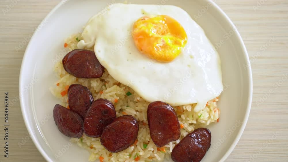 fried rice with fried egg and Chinese sausage - Homemade food in Asian style fried rice with fried egg and Chinese sausage - Homemade food in Asian style