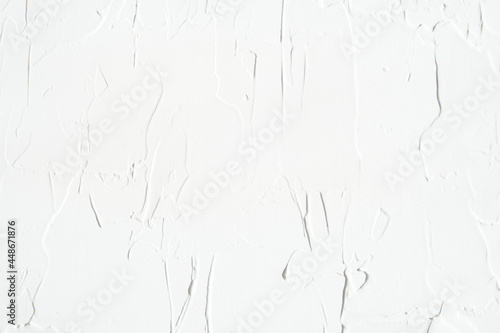 Rustic white textured background with shallow depth of field.