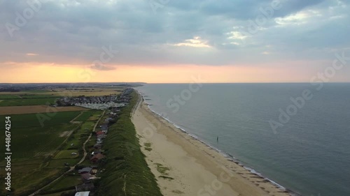 4k Aerial Shot of Scenic Landscape Along the Coast of Norfolk, England photo