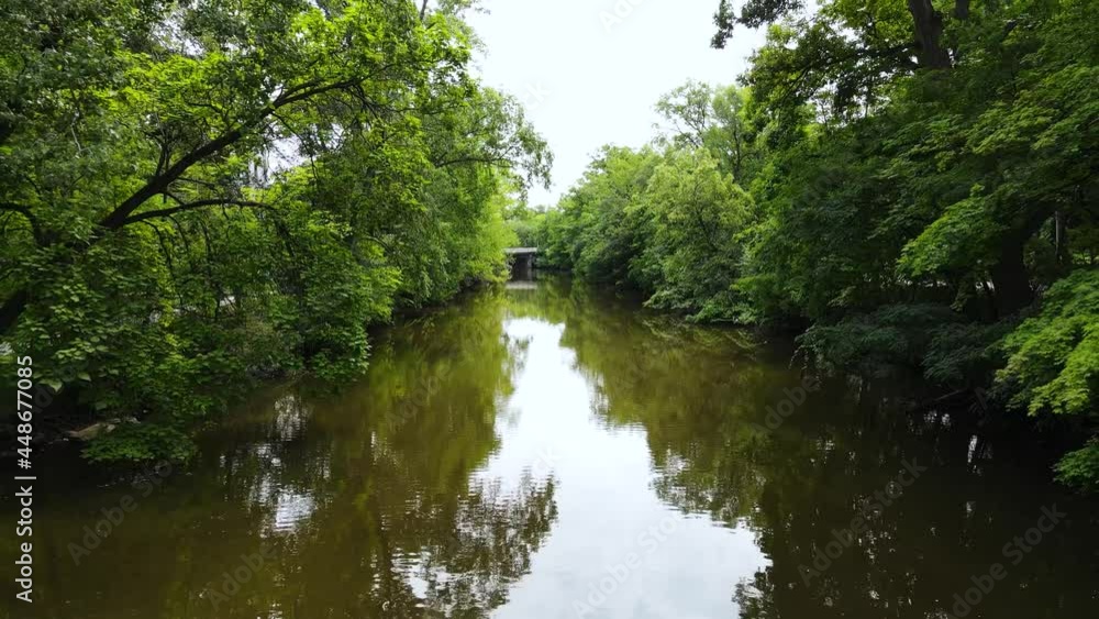 Tracking backwards over a dirty river in summer 2021. Tracking backwards over a dirty river in summer 2021.