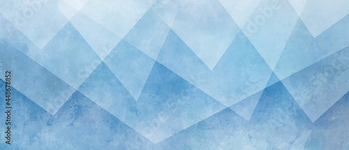 modern abstract blue background design with layers of textured white transparent material in triangle diamond and squares shapes in random geometric pattern with grunge watercolor texture