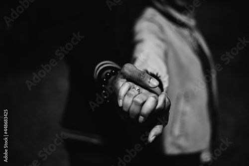 hand of a two lover in black and white
