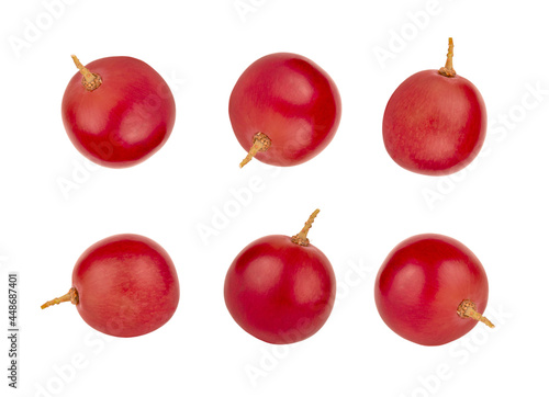 red ripe grapes on a white background. close-up.