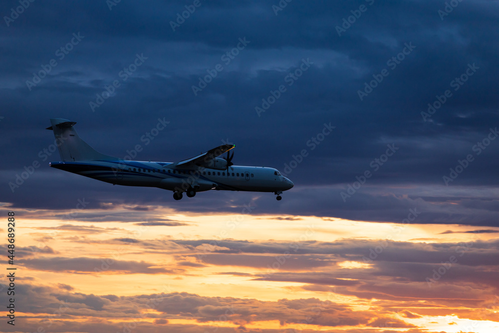 Passenger jet plane in the sky. Airplane flies high above the clouds. Passenger jet plane in the sky. Airplane flies high above the clouds.