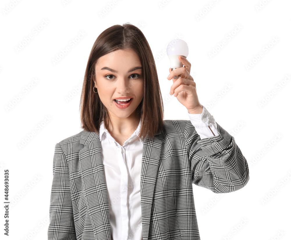 Young businesswoman with light bulb on white background Young businesswoman with light bulb on white background