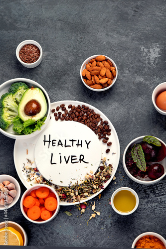 Best products for healthy liver on dark gray background. Clean eating concept.