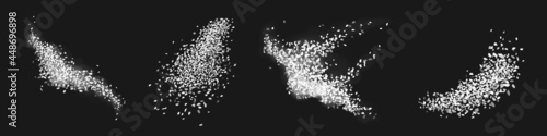 Scatters of white sugar or sea salt crystals
