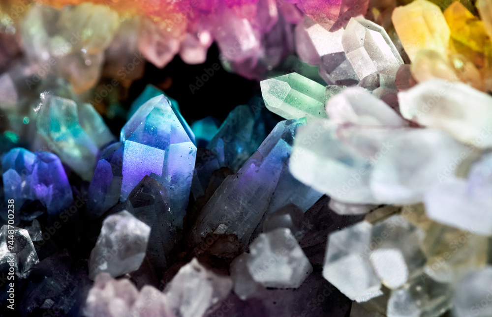 Crystal magic Quartz gem stone. Iridescent crystals. Sparkly texture of specimen with reflected luster light effect. Crystal magic Quartz gem stone. Iridescent crystals. Sparkly texture of specimen with reflected luster light effect.