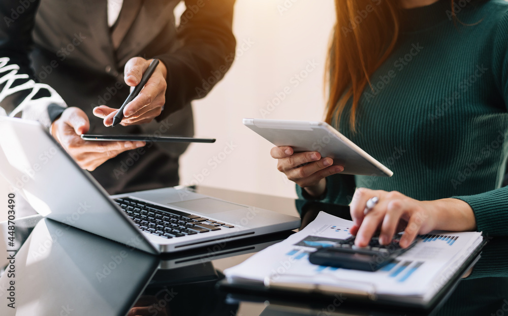 Business team meeting. professional investor working with smart phone, laptop and tablet computer Business team meeting. professional investor working with smart phone, laptop and tablet computer