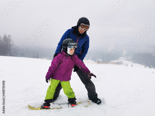 snowboard lesson in winter resort