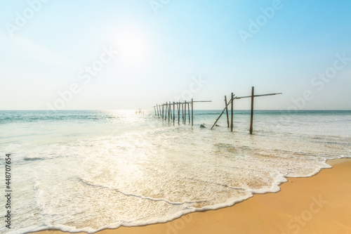 Old wooden bridge at Pilai Beach, Phang Nga Province © anake