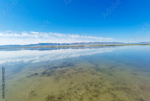 Reflection on Song Kul lake, Kyrgyzstan © Lena