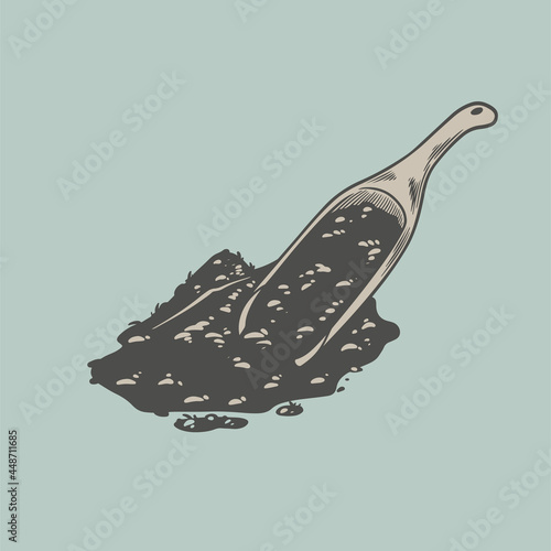 Wooden scoop with tea engra...