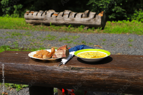 Traditional food on a resting place(sausage, swabian vegetable ravioli) in Rhoen mountains, Germany