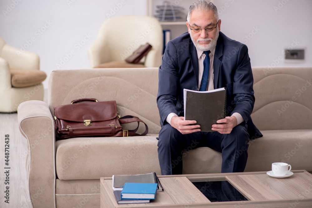 Old businessman employee waiting for business meeting Old businessman employee waiting for business meeting
