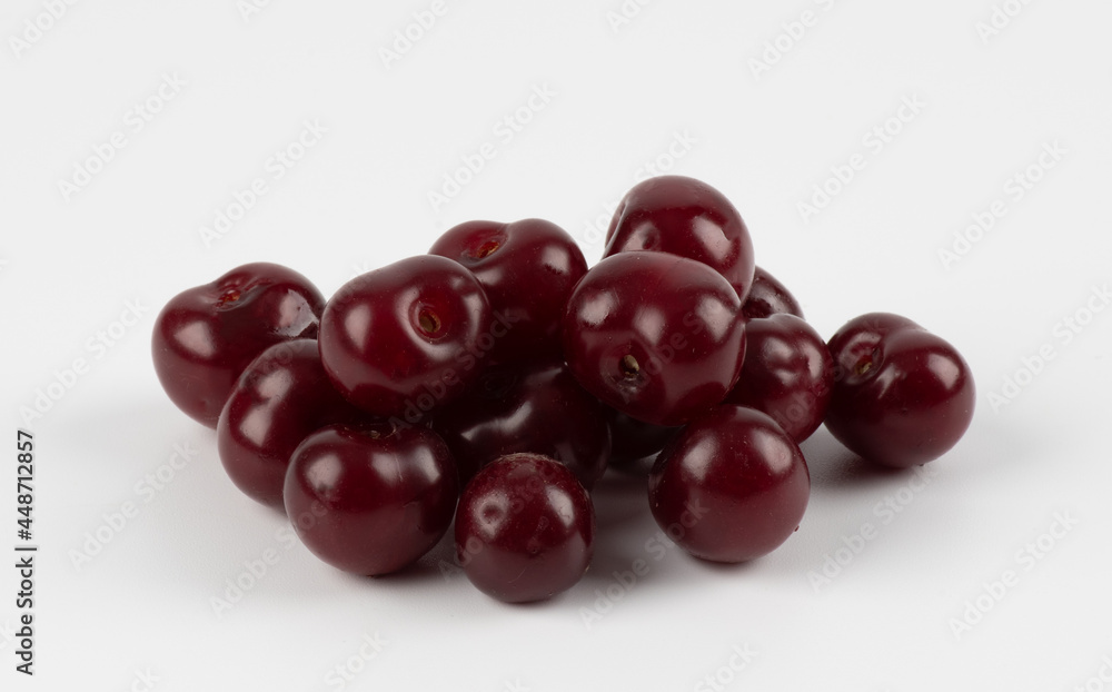 Isolated on White Cherry Background. Cherry isolated. Sour cherry. Cherries on white. Sour cherries on white. Isolated on White Cherry Background. Cherry isolated. Sour cherry. Cherries on white. Sour cherries on white.