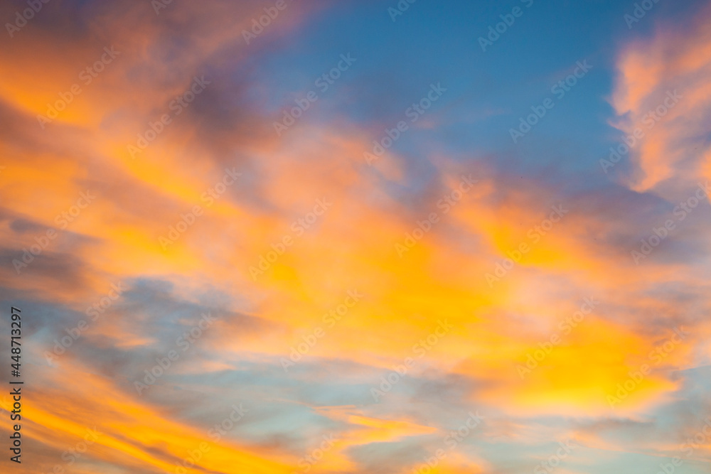 Blurred background. Blue sky and white fluffy clouds.