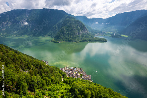 Aerial view of famous Hallstatt mountain village in the Austrian Alps at beautiful light in summer.