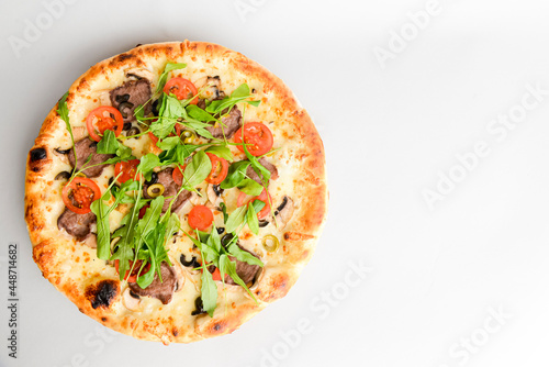 Tasty pizza with meat, mushrooms, tomatoes and basil isolated on white. Copy space banner, horizontal banner.
