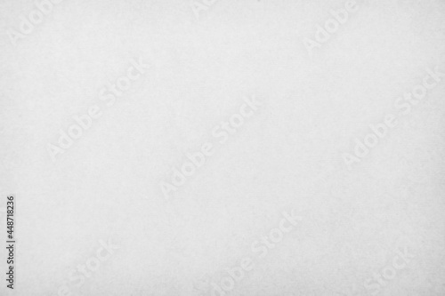 Old recycled craft cardboard texture as background. White paper dirty paper texture background. Vintage paper texture. High resolution grunge surface backdrop of grey.