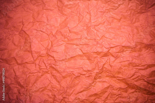 Red crumpled paper texture.