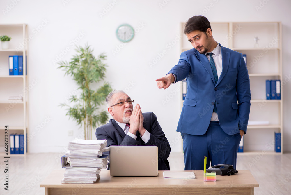 Two male employees in unemployment concept Two male employees in unemployment concept