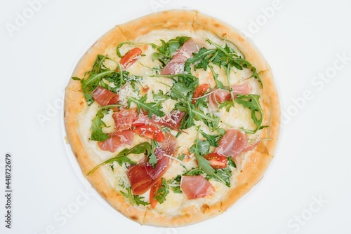 Delicious italian pizza over white background top view