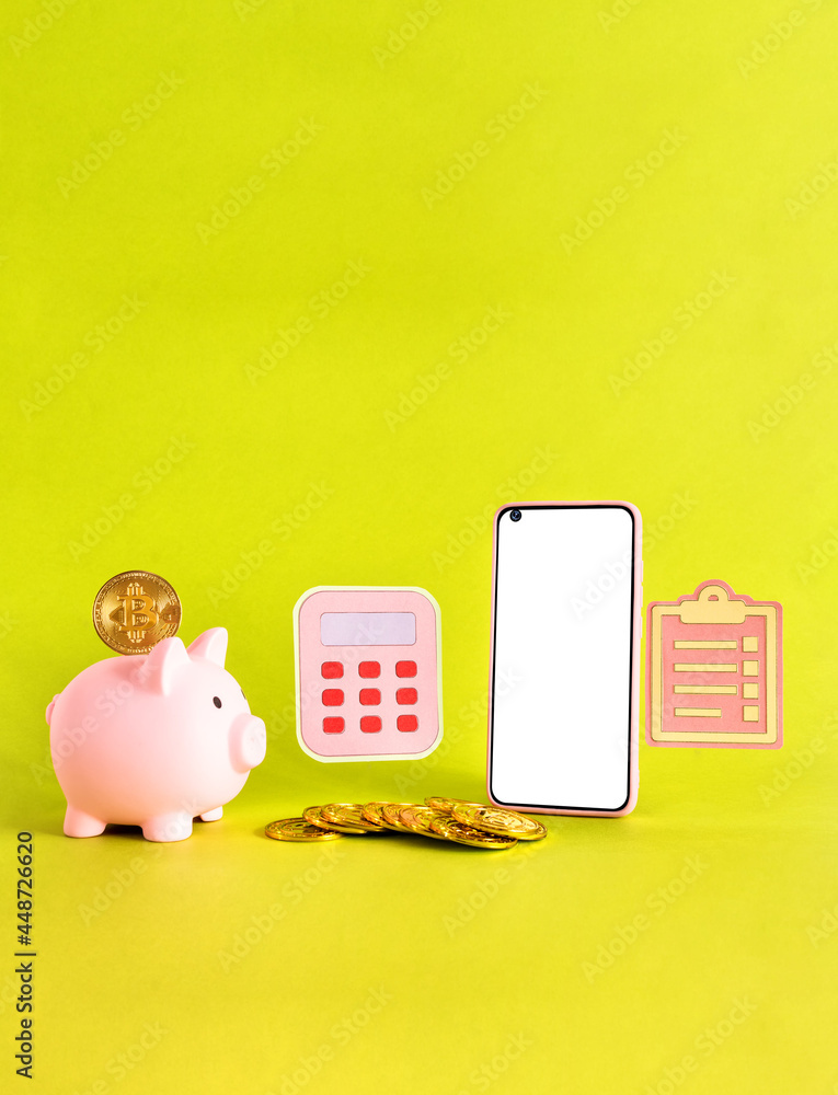 smart phone, piggy bank, calculator, coins, bit coin, on yellow background. Savings concept. smart phone, piggy bank, calculator, coins, bit coin, on yellow background. Savings concept.