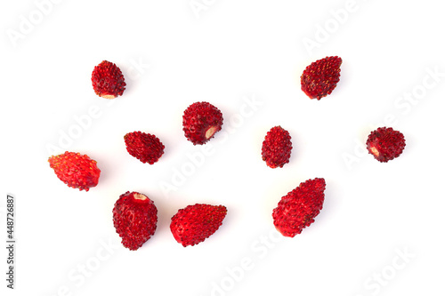Wild strawberry isolated on white background. Flatlay