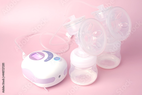 A picture of portable breast pump been switch on before lactate. High demand breast pump as can use battery and direct power source.