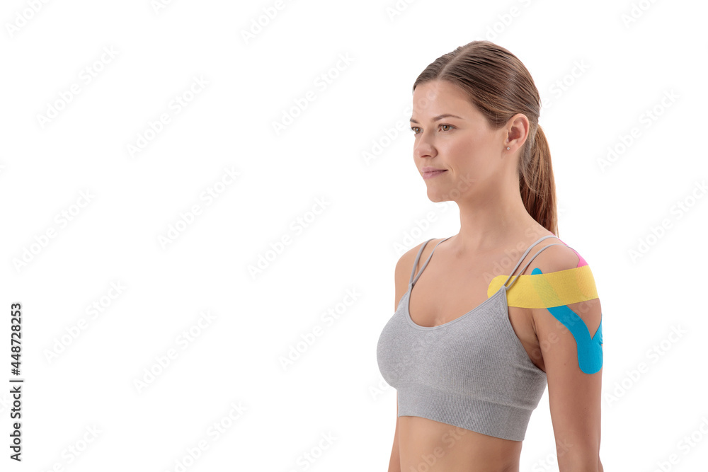 dynamic functional bandage with taping on female shouder isolated on white background dynamic functional bandage with taping on female shouder isolated on white background
