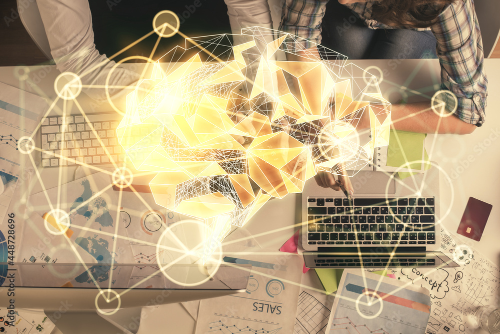Double exposure of man and woman working together and human brain hologram drawing. Brainstorm concept. Computer background. Top View.