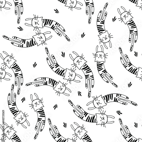 Funny vector seamless pattern with hand drawn difference cats, paws, naive childish ornament. Doodle pattern for printing on fabric, clothing, wrapping paper, wallpaper for a kid's room, baby things