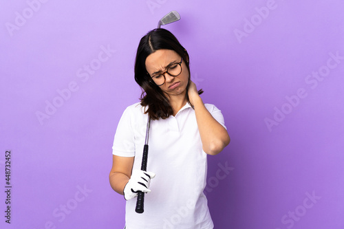 Young golfer woman over isolated colorful background with neckache