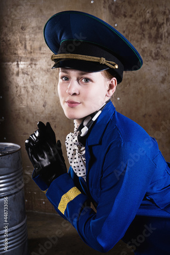 Young beautiful flight attendant in uniform. Not contain any logos or trademark. photo