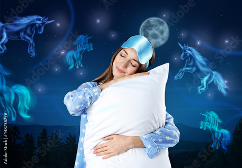 Obraz na plátně Beautiful woman dreaming about unicorns while sleeping, night starry sky with fu