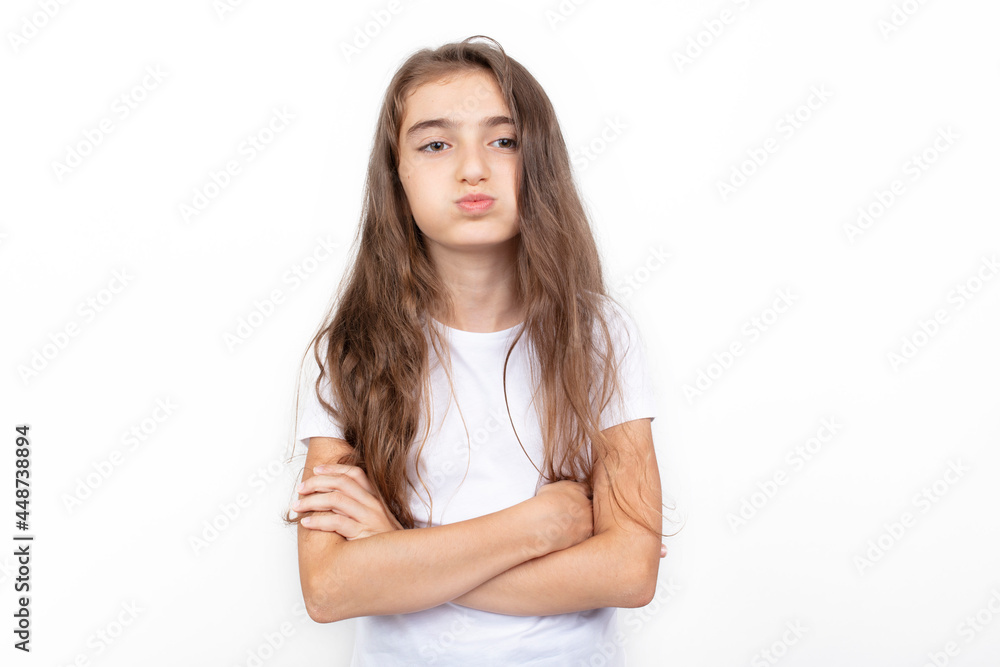 Portrait of angry or bored girl. A little cute Girl is sulking. Portrait of angry or bored girl. A little cute Girl is sulking.