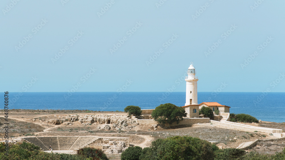 A view of the lighthouse and the Odeon fragment in Paphos, Cyprus.