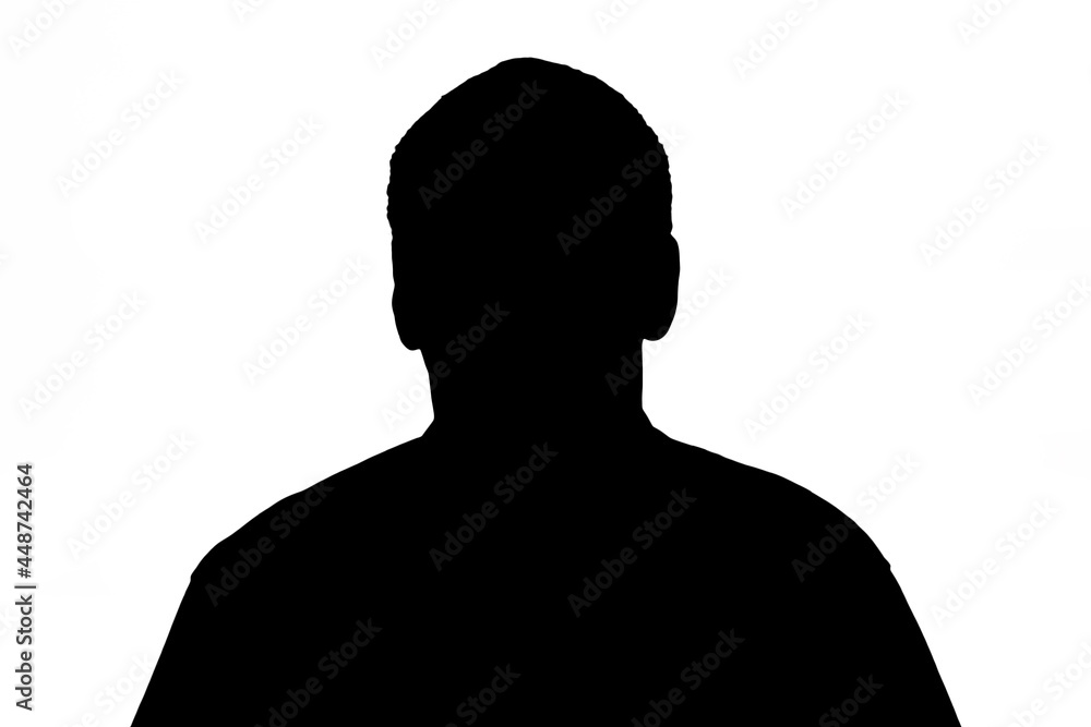 Silhouette of an unknown man. Anonymous portrait of a man in the shadow