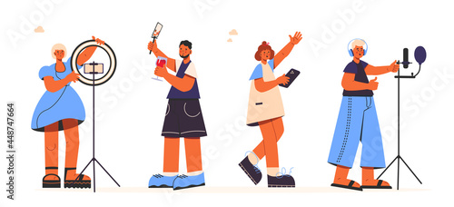 Bloggers and video vloggers. Man and woman with light ring, selfie stick, microphone, headphones and tripod equipment. Making social media content for blog and vlog. Video Streamer. Live Broadcast.