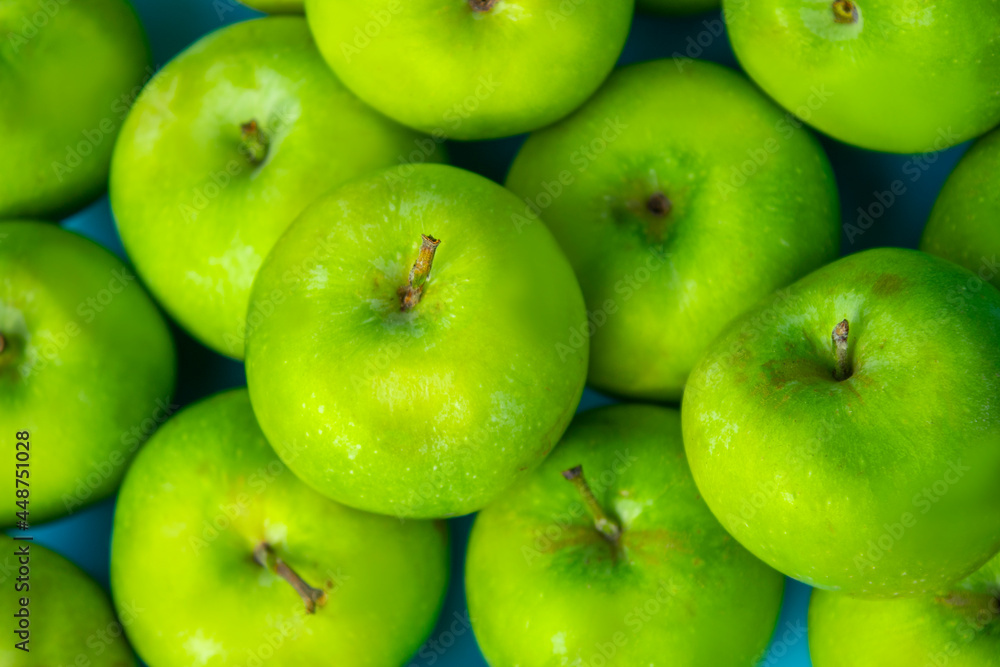 green apples on blue background, fruits green apples on blue background, fruits