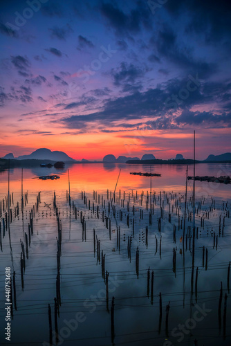 Fototapeta Naklejka Na Ścianę i Meble -  Beautiful sky in the morning during sunrise at fisherman village of Sam-Chong-Tai, Phang-Nga province, Thailand.