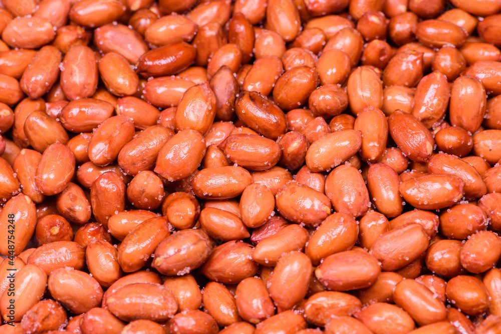 The traditional Chinese food is fried, crispy and fragrant peanuts with salt The traditional Chinese food is fried, crispy and fragrant peanuts with salt