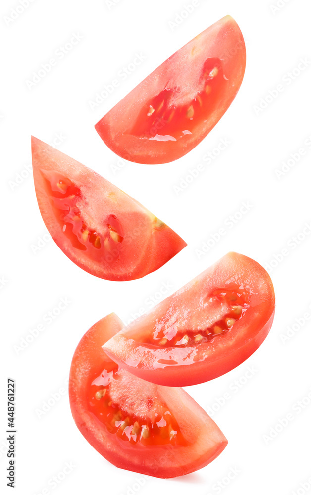 Tomato slices drops on a white background. Isolated Tomato slices drops on a white background. Isolated