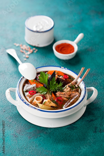 Traditional Caucasian dish Hashlama. Lamb meat and vegetables stew. Armenian cuisine, selective focus. photo