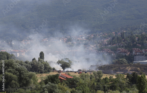 A large fire is burning from burning stubble in Sofia, Bulgaria on August, 3, 2021. The fire is burning the forest, field, houses above living areas Manastirski Livadi and Krastova vada