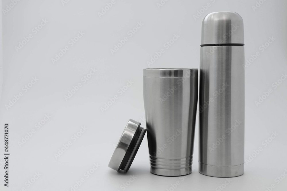 stainless hip flask on smoke background stainless hip flask on smoke background