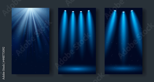 Set of dark blue backgrounds with glowing spotlights and light rays. Vector illustration. photo